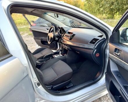 Серый Мицубиси Лансер, объемом двигателя 2 л и пробегом 223 тыс. км за 6890 $, фото 17 на Automoto.ua