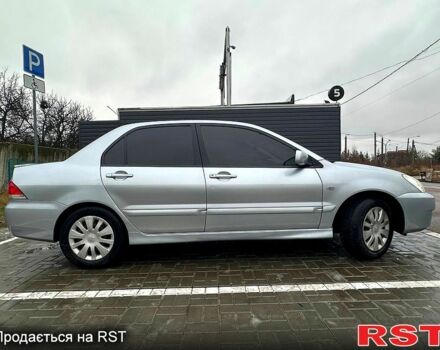 Серый Мицубиси Лансер, объемом двигателя 1.6 л и пробегом 165 тыс. км за 4000 $, фото 12 на Automoto.ua