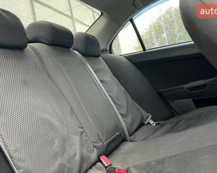 Серый Мицубиси Лансер, объемом двигателя 1.5 л и пробегом 239 тыс. км за 6000 $, фото 20 на Automoto.ua