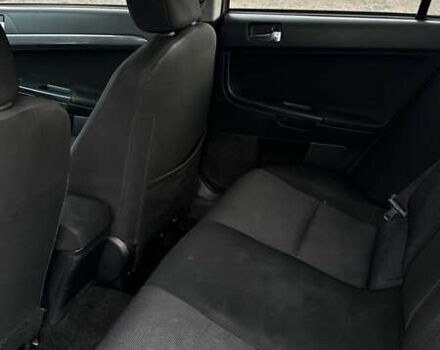 Сірий Міцубісі Lancer, об'ємом двигуна 2 л та пробігом 210 тис. км за 7100 $, фото 18 на Automoto.ua