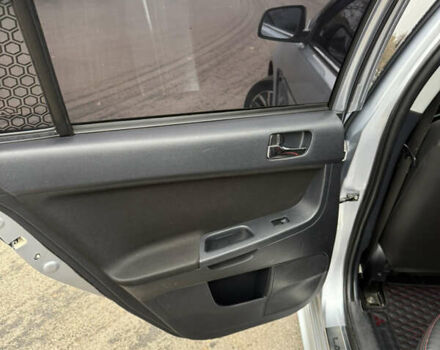 Сірий Міцубісі Lancer, об'ємом двигуна 2 л та пробігом 253 тис. км за 8700 $, фото 28 на Automoto.ua