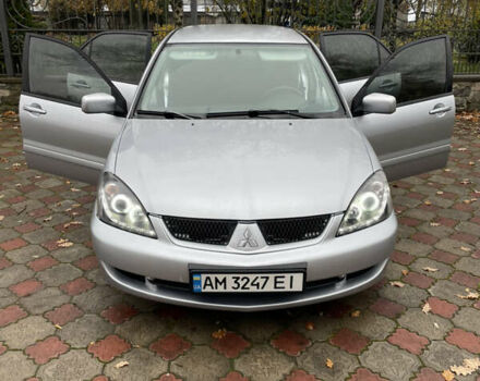 Сірий Міцубісі Lancer, об'ємом двигуна 1.59 л та пробігом 219 тис. км за 4500 $, фото 18 на Automoto.ua