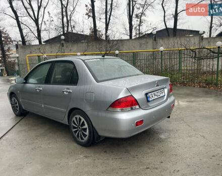 Сірий Міцубісі Lancer, об'ємом двигуна 1.58 л та пробігом 220 тис. км за 5900 $, фото 2 на Automoto.ua