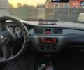 Серый Мицубиси Лансер, объемом двигателя 1.6 л и пробегом 234 тыс. км за 4300 $, фото 7 на Automoto.ua