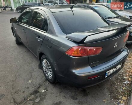 Сірий Міцубісі Lancer, об'ємом двигуна 1.5 л та пробігом 202 тис. км за 5899 $, фото 12 на Automoto.ua