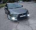 Серый Мицубиси Лансер, объемом двигателя 1.5 л и пробегом 213 тыс. км за 6500 $, фото 1 на Automoto.ua