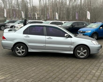 Серый Мицубиси Лансер, объемом двигателя 1.6 л и пробегом 205 тыс. км за 5400 $, фото 7 на Automoto.ua