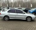 Серый Мицубиси Лансер, объемом двигателя 1.6 л и пробегом 205 тыс. км за 5400 $, фото 7 на Automoto.ua