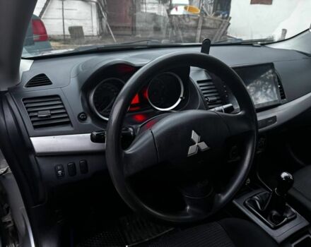 Серый Мицубиси Лансер, объемом двигателя 1.5 л и пробегом 147 тыс. км за 6700 $, фото 11 на Automoto.ua