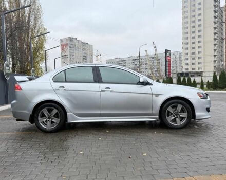 Серый Мицубиси Лансер, объемом двигателя 2 л и пробегом 210 тыс. км за 6500 $, фото 6 на Automoto.ua