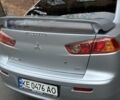Серый Мицубиси Лансер, объемом двигателя 2 л и пробегом 203 тыс. км за 6500 $, фото 6 на Automoto.ua