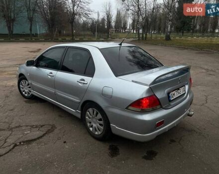 Сірий Міцубісі Lancer, об'ємом двигуна 1.6 л та пробігом 254 тис. км за 3800 $, фото 6 на Automoto.ua