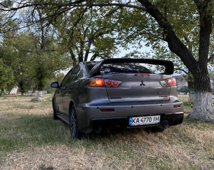 Серый Мицубиси Лансер, объемом двигателя 1.5 л и пробегом 255 тыс. км за 6000 $, фото 6 на Automoto.ua