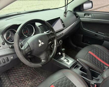 Сірий Міцубісі Lancer, об'ємом двигуна 2 л та пробігом 253 тис. км за 8700 $, фото 36 на Automoto.ua