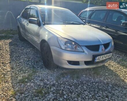 Сірий Міцубісі Lancer, об'ємом двигуна 1.6 л та пробігом 240 тис. км за 2999 $, фото 4 на Automoto.ua