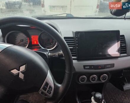 Серый Мицубиси Лансер, объемом двигателя 2 л и пробегом 175 тыс. км за 6500 $, фото 4 на Automoto.ua