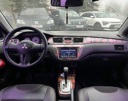 Серый Мицубиси Лансер, объемом двигателя 1.6 л и пробегом 205 тыс. км за 5400 $, фото 9 на Automoto.ua