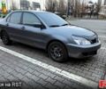 Серый Мицубиси Лансер, объемом двигателя 1.6 л и пробегом 289 тыс. км за 5600 $, фото 1 на Automoto.ua