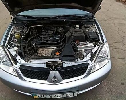 Серый Мицубиси Лансер, объемом двигателя 1.58 л и пробегом 176 тыс. км за 5000 $, фото 21 на Automoto.ua