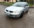 Сірий Міцубісі Lancer, об'ємом двигуна 1.6 л та пробігом 224 тис. км за 3100 $, фото 1 на Automoto.ua
