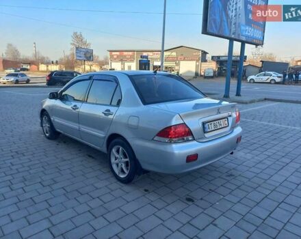 Серый Мицубиси Лансер, объемом двигателя 1.6 л и пробегом 228 тыс. км за 2999 $, фото 15 на Automoto.ua