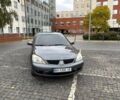 Серый Мицубиси Лансер, объемом двигателя 1.6 л и пробегом 218 тыс. км за 5100 $, фото 1 на Automoto.ua