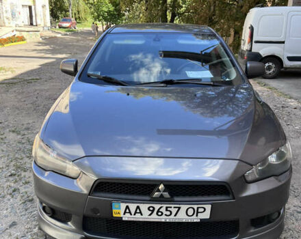 Серый Мицубиси Лансер, объемом двигателя 2 л и пробегом 222 тыс. км за 6999 $, фото 2 на Automoto.ua