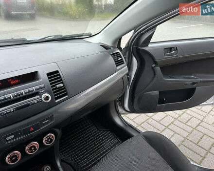 Серый Мицубиси Лансер, объемом двигателя 2 л и пробегом 279 тыс. км за 4999 $, фото 17 на Automoto.ua