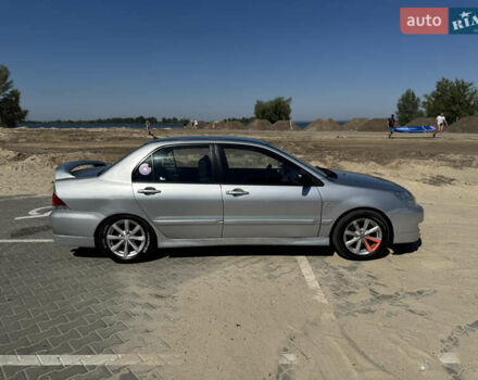 Сірий Міцубісі Lancer, об'ємом двигуна 1.6 л та пробігом 337 тис. км за 4500 $, фото 2 на Automoto.ua