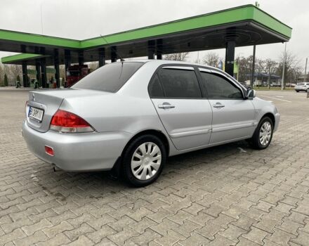 Сірий Міцубісі Lancer, об'ємом двигуна 1.6 л та пробігом 240 тис. км за 4650 $, фото 7 на Automoto.ua