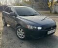 Сірий Міцубісі Lancer, об'ємом двигуна 1.5 л та пробігом 236 тис. км за 6000 $, фото 1 на Automoto.ua