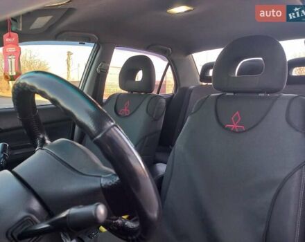 Серый Мицубиси Лансер, объемом двигателя 1.6 л и пробегом 228 тыс. км за 2999 $, фото 32 на Automoto.ua