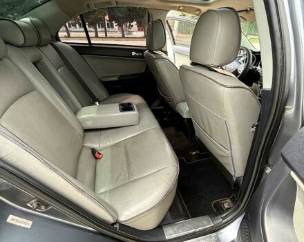 Мицубиси Лансер 2009 в Смеле на Automoto.ua Серый Мицубиси Лансер, объемом двигателя 2 л и пробегом 183 тыс. км за 6500 $, фото 2 на Automoto.ua