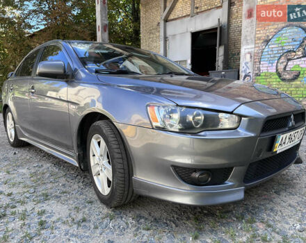 Серый Мицубиси Лансер, объемом двигателя 2 л и пробегом 222 тыс. км за 6999 $, фото 1 на Automoto.ua