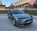 Серый Мицубиси Лансер, объемом двигателя 2 л и пробегом 296 тыс. км за 5999 $, фото 1 на Automoto.ua