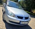 Серый Мицубиси Лансер, объемом двигателя 1.6 л и пробегом 200 тыс. км за 3950 $, фото 1 на Automoto.ua