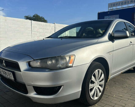 Серый Мицубиси Лансер, объемом двигателя 1.5 л и пробегом 230 тыс. км за 6300 $, фото 2 на Automoto.ua