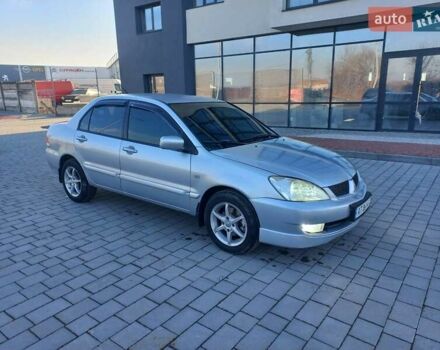 Серый Мицубиси Лансер, объемом двигателя 1.6 л и пробегом 228 тыс. км за 2999 $, фото 11 на Automoto.ua