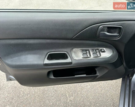 Сірий Міцубісі Lancer, об'ємом двигуна 1.58 л та пробігом 94 тис. км за 6500 $, фото 15 на Automoto.ua