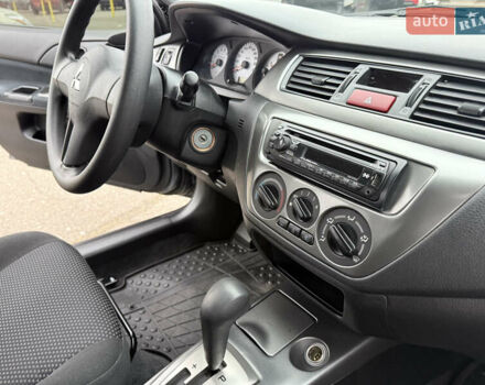 Сірий Міцубісі Lancer, об'ємом двигуна 0 л та пробігом 62 тис. км за 7250 $, фото 13 на Automoto.ua