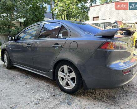 Серый Мицубиси Лансер, объемом двигателя 2 л и пробегом 222 тыс. км за 6999 $, фото 3 на Automoto.ua