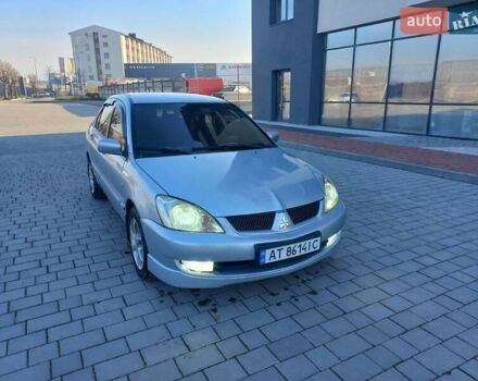 Серый Мицубиси Лансер, объемом двигателя 1.6 л и пробегом 228 тыс. км за 2950 $, фото 2 на Automoto.ua