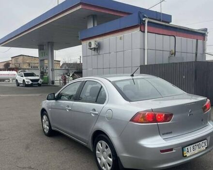 Серый Мицубиси Лансер, объемом двигателя 1.5 л и пробегом 190 тыс. км за 5800 $, фото 2 на Automoto.ua