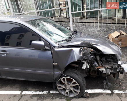 Міцубісі Lancer 2009 у Києві на Automoto.ua Сірий Міцубісі Lancer, об'ємом двигуна 1.6 л та пробігом 191 тис. км за 1500 $, фото 5 на Automoto.ua