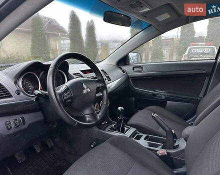 Серый Мицубиси Лансер, объемом двигателя 2 л и пробегом 279 тыс. км за 4999 $, фото 13 на Automoto.ua