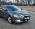 Серый Мицубиси Лансер, объемом двигателя 1.5 л и пробегом 218 тыс. км за 4750 $, фото 1 на Automoto.ua