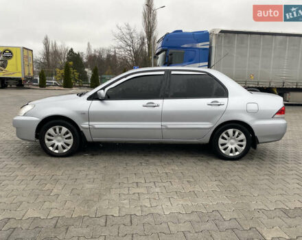 Сірий Міцубісі Lancer, об'ємом двигуна 1.58 л та пробігом 280 тис. км за 4650 $, фото 2 на Automoto.ua
