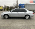 Сірий Міцубісі Lancer, об'ємом двигуна 1.58 л та пробігом 280 тис. км за 4650 $, фото 2 на Automoto.ua