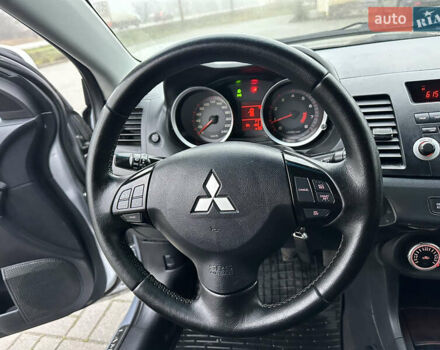 Серый Мицубиси Лансер, объемом двигателя 2 л и пробегом 279 тыс. км за 4999 $, фото 16 на Automoto.ua