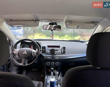 Серый Мицубиси Лансер, объемом двигателя 2 л и пробегом 222 тыс. км за 6999 $, фото 5 на Automoto.ua